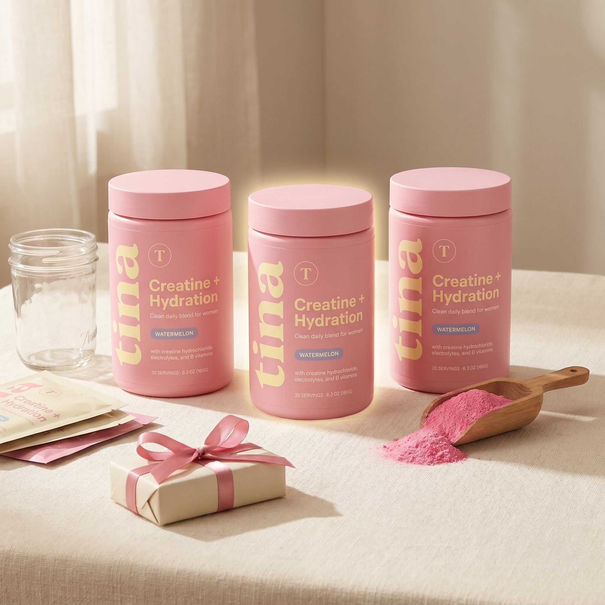 3 TINA Creatine + Hydration jars with scoop, glass jar, travel sachets, and mystery gift
