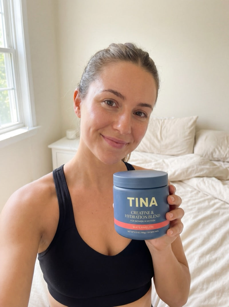 Amanda holding TINA creatine