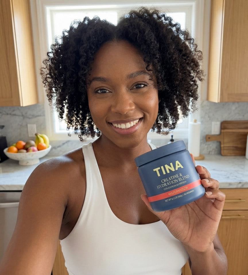 Sarah holding TINA creatine